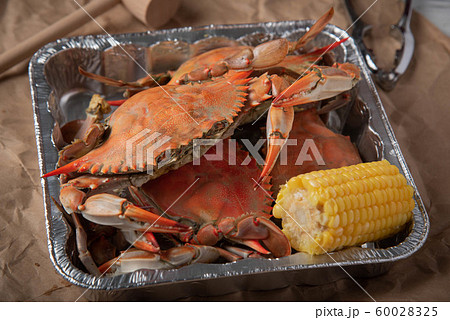 steamed chesapeake blue crab on paper 60028325