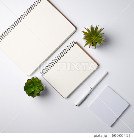 open spiral notebook with empty sheets, pots with open spiral notebook with empty sheets, pots with 60030412