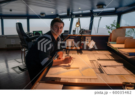 Marine navigational officer during navigational watch on Bridge 60035462