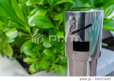 Area for smoking cigarettes with an ashtray Area for smoking cigarettes with an ashtray 60035665