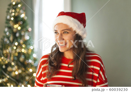 Christmas girl at home 60039230