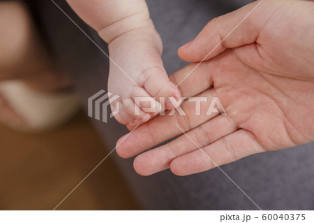 Happy young parents with baby 018 Happy young parents with baby 018 60040375