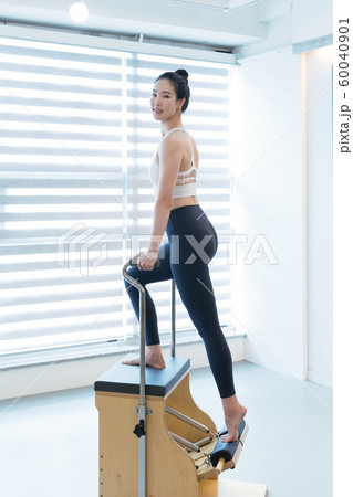 Healthy life, exercising pilates using pilates device 120 60040901