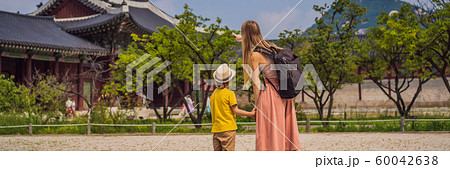 Mom and son tourists in Seoul, South Korea. Travel to Korea concept. Traveling with children concept Mom and son tourists in Seoul, South Korea. Travel to Korea concept. Traveling with children concept 60042638