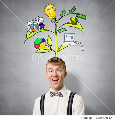Happy teenager with broad smile in eureka moment Happy teenager with broad smile in eureka moment 60047032