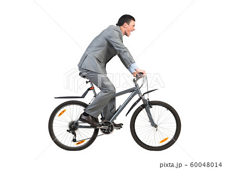Businessman on bike hurry to work 60048014
