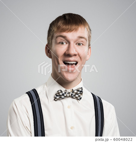 Happy hipster with mouth opened Happy hipster with mouth opened 60048022