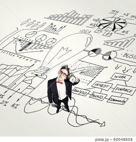 Funny businessman with alarm clock 60048608