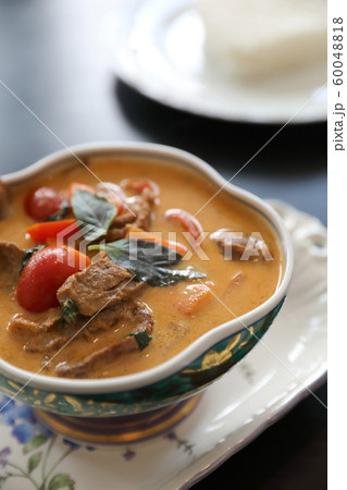 Roasted Duck in Red Curry with rice , Traditional Thai food Roasted Duck in Red Curry with rice , Traditional Thai food 60048818