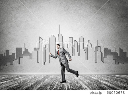 King businessman in elegant suit running and drawn cityscape silhouette at background King businessman in elegant suit running and drawn cityscape silhouette at background 60050678