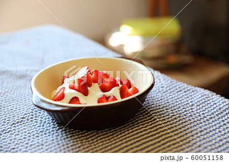 Strawberry with cream on table dessert 60051158