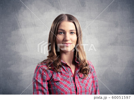 Young beautiful woman with charming smile Young beautiful woman with charming smile 60051597