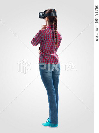 Young woman wearing virtual helmet Young woman wearing virtual helmet 60051760