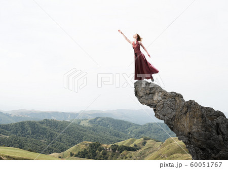 Concept of freedom and happiness with girl enjoying this life Concept of freedom and happiness with girl enjoying this life 60051767