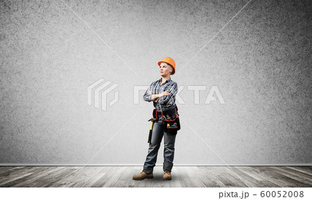 Attractive female engineer in hardhat 60052008