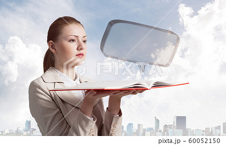 Woman looks at transparent speech bubble Woman looks at transparent speech bubble 60052150
