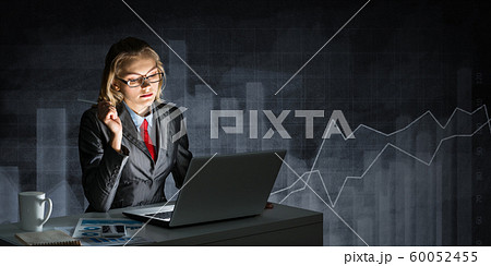 Attractive young businesswoman in glasses Attractive young businesswoman in glasses 60052455