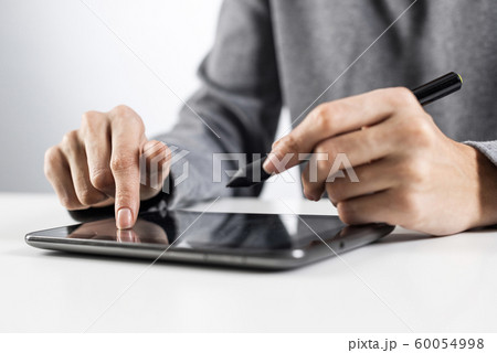 Woman using digital tablet computer 60054998