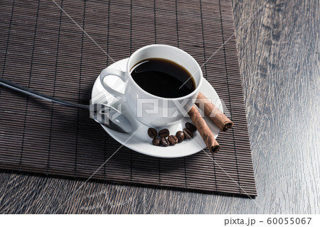 Cup of espresso coffee on wooden table Cup of espresso coffee on wooden table 60055067