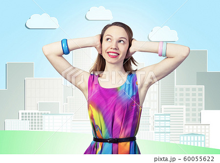 Redhead beautiful girl closing her ears with hands 60055622