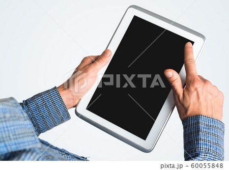 Hands of businessman holding tablet pc with black screen 60055848