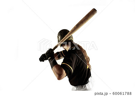 Baseball player, pitcher in a black uniform practicing on a white background. Baseball player, pitcher in a black uniform practicing on a white background. 60061788
