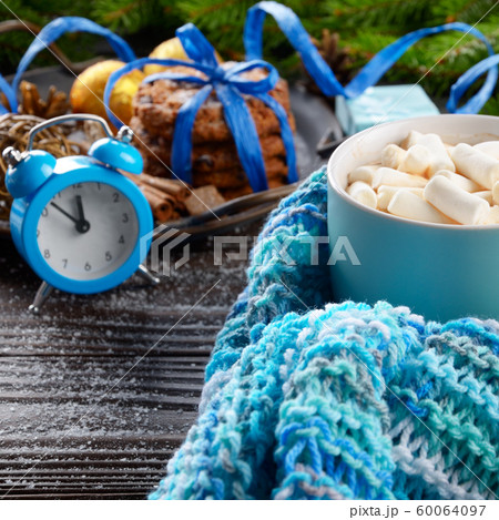 Christmas background of blue hot chocolate mug Christmas background of blue hot chocolate mug 60064097