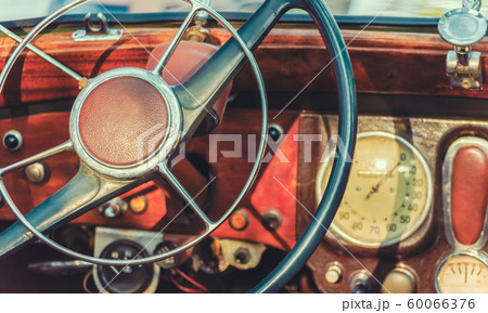 steering wheel and dashboard of an old retro car steering wheel and dashboard of an old retro car 60066376