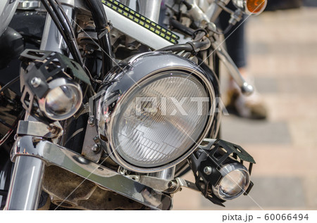 chrome shiny chopper motorcycle headlight close up chrome shiny chopper motorcycle headlight close up 60066494