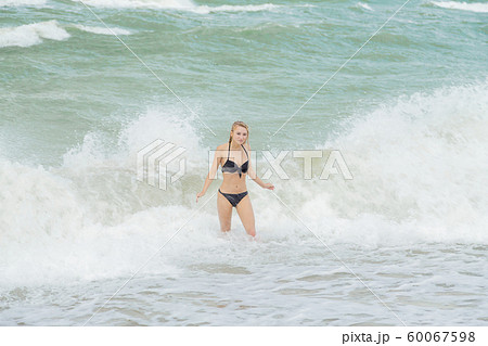 girl in surf 60067598