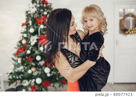 Mother with daughter 60077423