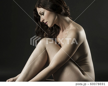 Beautiful nude woman posing on the floor - Stock Photo [60078691] - PIXTA