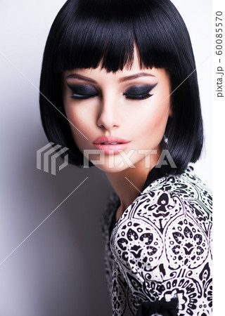 Beautiful brunette woman with short hairstyle. Beautiful brunette woman with short hairstyle. 60085570