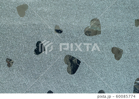 Shiny texture paper in a print of hearts. Foil for 60085774