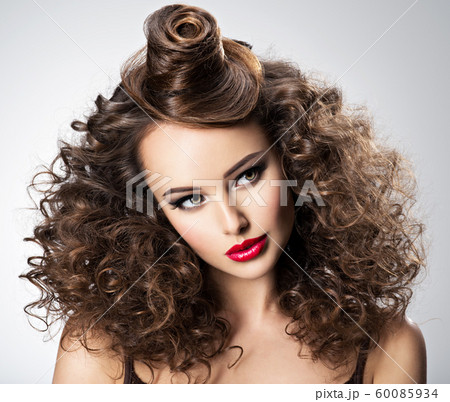 Beautiful woman with creative hairstyle. Beautiful woman with creative hairstyle. 60085934
