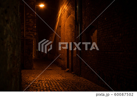 lamp lighting in the narrow streets of night city 60087502