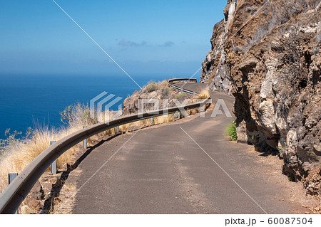 mountain road along the coast of the la palma island 60087504