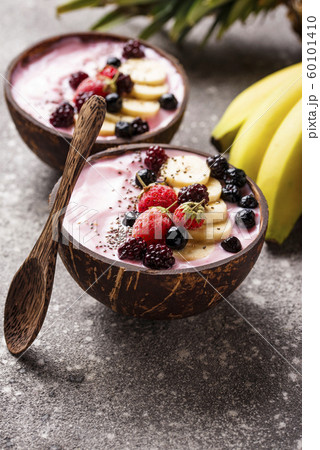 Acai bowl in coconut plate. 60101410