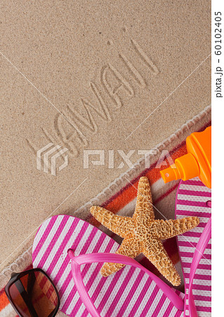 Word HAWAII written in sand with beach Word HAWAII written in sand with beach 60102405