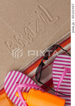 Word BRAZIL written in sand with beach Word BRAZIL written in sand with beach 60102407