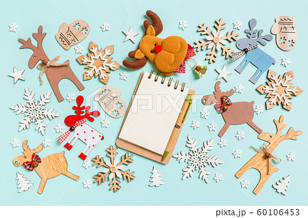 Top view of notebook on blue background made of Top view of notebook on blue background made of 60106453