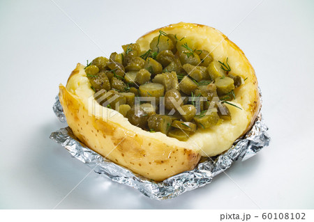 Photo of baked potato with gherkins filling 60108102