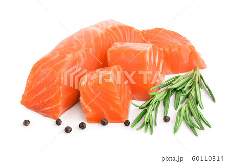 raw salmon piece cube with rosemary and peppercorn isolated on white background close up 60110314