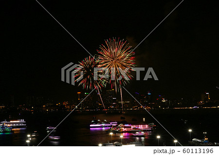 flower fireworks on beach and reflection color on 60113196