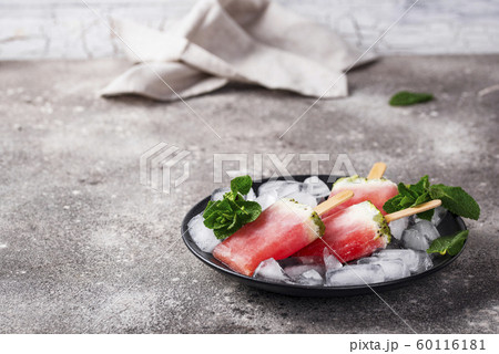 Homemade popsicles in shape of watermelon 60116181