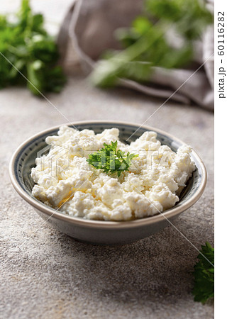 Bowl with homemade cottage cheese 60116282