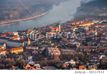 Small City near a River at Sunrise 60117614