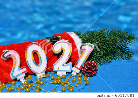 Christmas decorations and pine branch 2021. Christmas decorations and pine branch 2021. 60117681