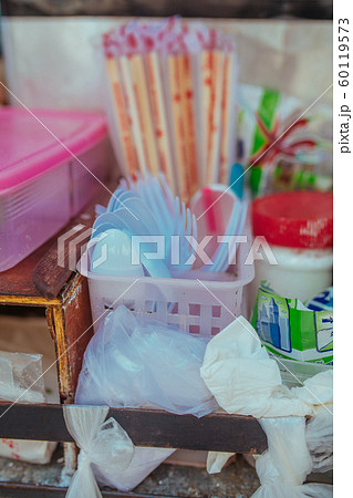 Plastic cutlery and bamboo sticks in Asia Plastic cutlery and bamboo sticks in Asia 60119573