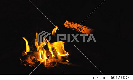 Forge fire in furnace. Blacksmith tempers a steel product in a stove. Smithy forging for hardening and heating iron. Blacksmith stove. Slow Motion. Forge fire in furnace. Blacksmith tempers a steel product in a stove. Smithy forging for hardening and heating iron. Blacksmith stove. Slow Motion. 60123838